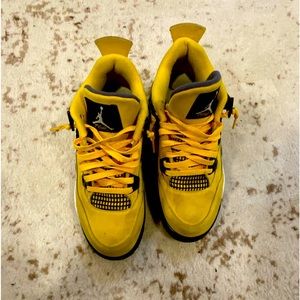 Used lightning Jordan 4s